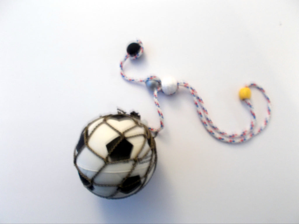 Miniature soccer ball with hanger to display on a rear view mirror inside of a vehicle.